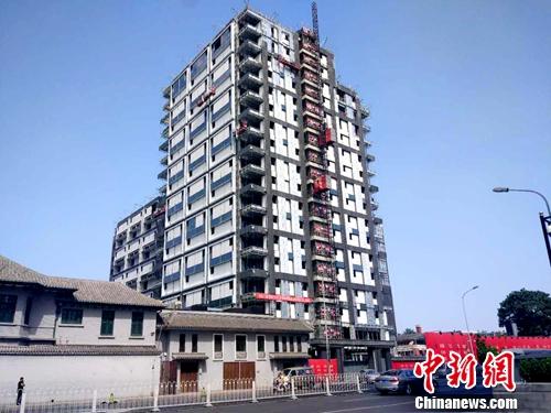 北京一处正在建设的楼房。<a target='_blank' href='http://www.chinanews.com/' >中新网记者 李金磊 摄